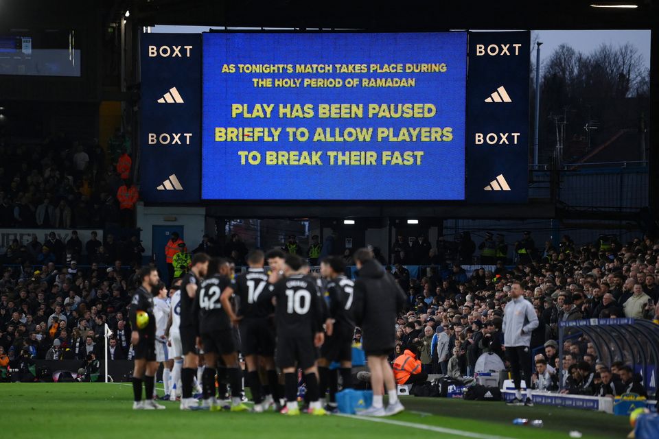 A big screen displays a message as play stop for Ramadan